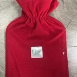 A red flannel thermal container designed for heat therapy and warming, made by Elite Solution. The Elite hot water bottle. Elite Hot Water Bag